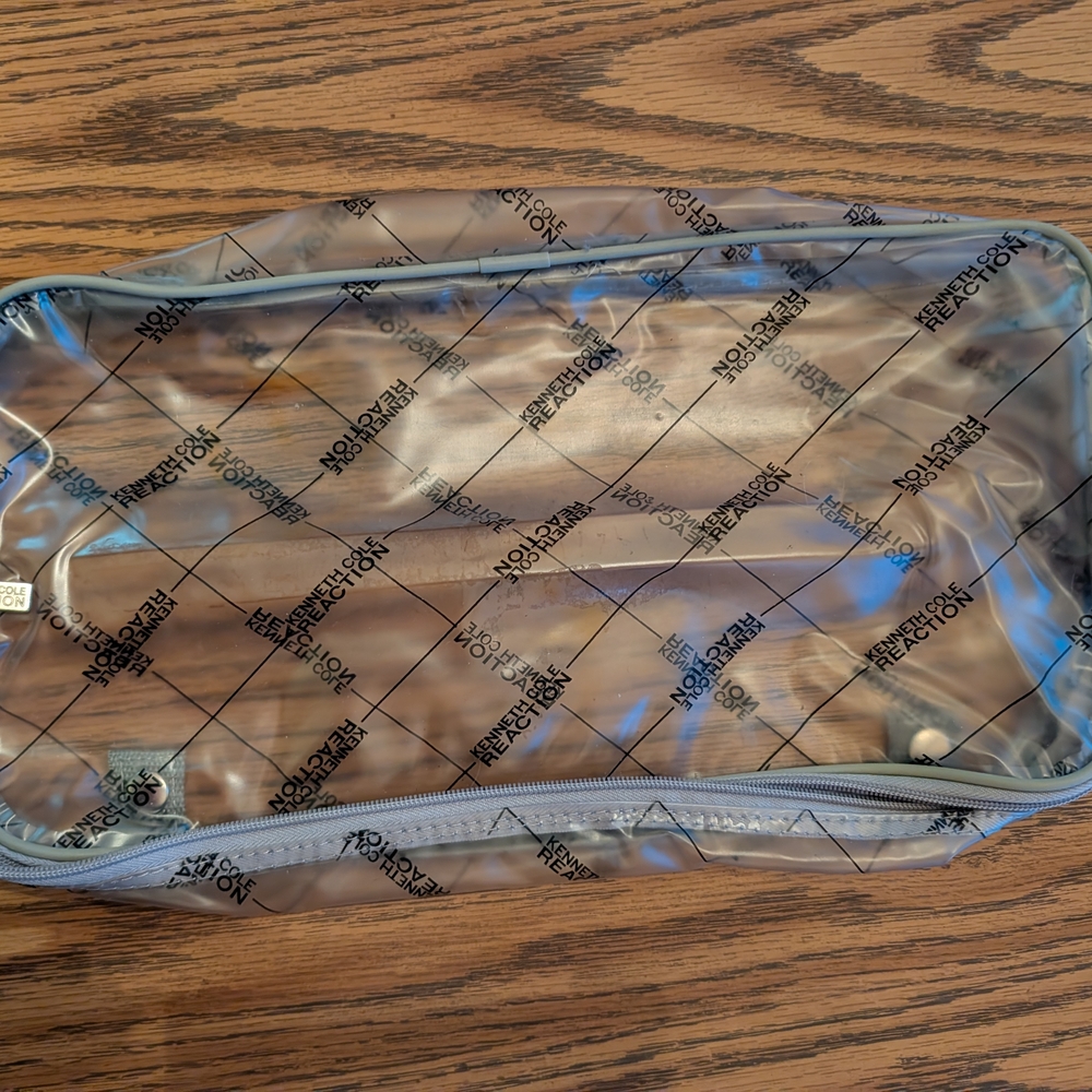 Kenneth Cole Reaction Silver Cosmetic Bag with Black Print